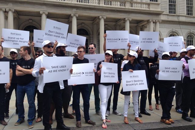 Uber employees protesting an Uber cap on the steps of City Hall in July (Emma Whitford/Gothamist).